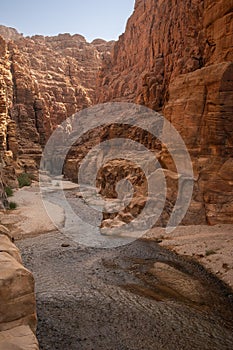 Vertical Scenery of Arnon Stream with Rocky Canyon in Jordan