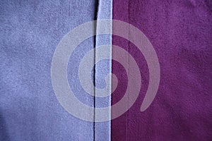 Vertical seam between two colors of suede