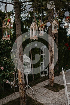 Vertical shallow focus shot of an outdoor wedding ceremony reception decorations