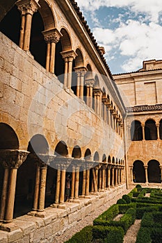 Vertical shot of the Abbey of Santo Domingo de Silos with a beautiful garden in Spain photo