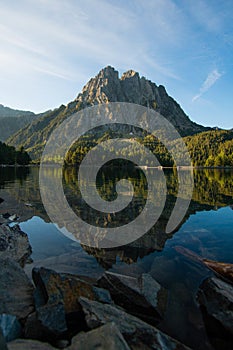 Vertical shot of the amazing landscpaes and a criytally clear water under the blue sky