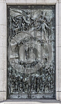 Vertical shot of an ancient door with holy detials