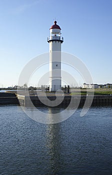 Vertical shot of an ancient Hellevoetsluis Lighthouse in the Netherlands at the seaside