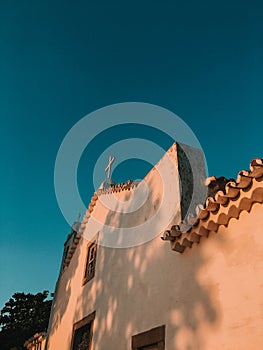 Vertical shot of an ancient historical cathedral architectural details under a perfectly clear sky