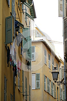 Vertical shot of apartment old buildings in Nizza, France photo