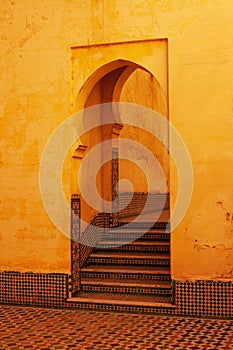 Vertical shot of the arches in Mausoleum of Moulay Ismail interior in Meknes in Morocco