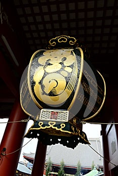 Vertical shot of a beautiful medieval copper lantern at Senso-ji Temple in Asakusa, Tokyo, Japan