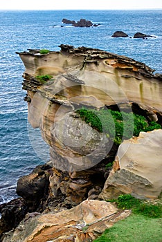Vertical shot of a beautiful rock formation near the sea in Yehliu, Taiwan