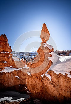 Vertical shot of the beautiful rocks covered in snow in Bryce Canyon National Park