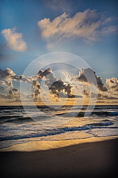 Vertical shot of a beautiful sea at sunrise in Outer Banks, North Carolina, USA