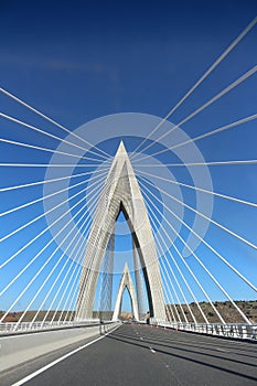 Vertical shot of a beautifully architectured Pont Mohammed VI cable-stayed bridge at daytime