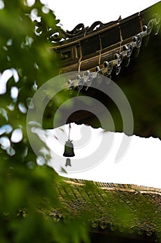 Vertical shot of a bell hanging in the White Cloud Temple (Baiyun Temple) in Beijing, China