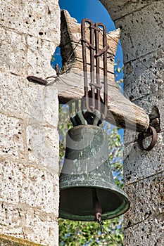 Vertical shot of the bell in San Juan Evangelista church in Arroyo de la Encomienda in Valladolid photo