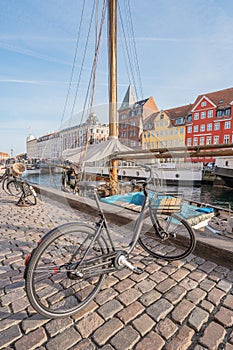 Vertical shot of a bicycle in Nyhavn Copenhagen Denmark