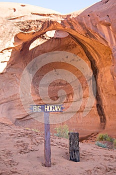 Vertical shot of a the Big Hogan arch at Monument Valley Navajo Tribal Park, USA