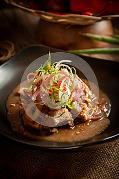 Vertical shot of bistek tagalog in a kitchen photo