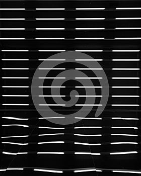 Vertical shot of a black and white striped patterned background for wallpapers