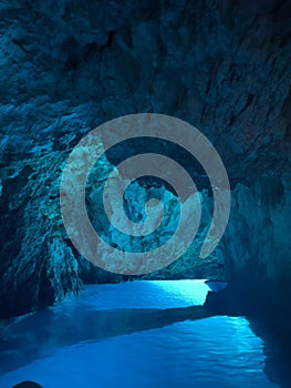 Vertical shot of the Blue Cave in the Croatian Adriatic