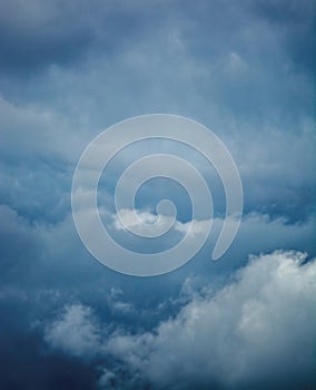 Vertical shot of a blue cloudy sky - perfect for wallpapers and backgrounds