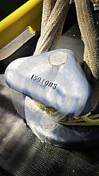 Vertical shot boat bitts blue sky background