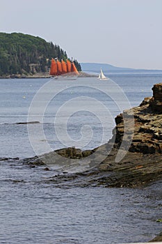 Vertical shot of boats sailing on Frenchman Bay at Agamont Park, Bar Harbor in Maine, USA