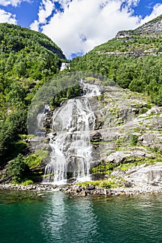 Vertical shot of Bringefossen waterfall in Geiranger Fjord, Sunnmore, More og Romsdal, Norway