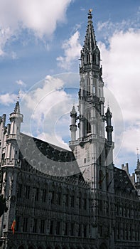 Vertical shot of the Brussels Town Hall in Grand Place, Brussels, Belgium