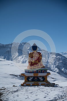 Vertical shot of Buddha statue in Langza village, Spiti Valley in winter