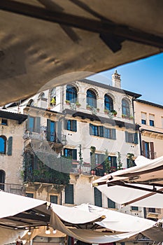 Vertical shot of a building in Piazza delle Erbe, Verona in summer