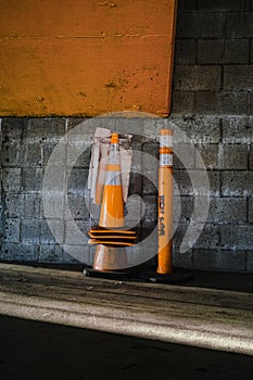 Vertical shot of a bunch of roadblocks near a street photo