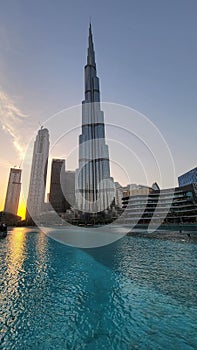 Vertical shot of the Burj Khalifa skyscraper in Dubai at sunset