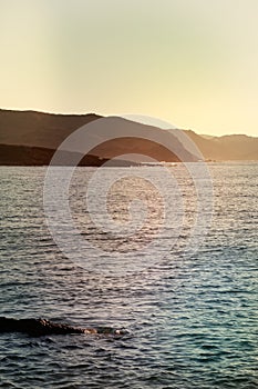 Vertical shot of a calm sea on the coast of Menorca, Islas Baleares in Spain