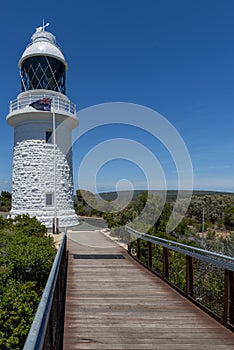 Vertical shot of the Cape Naturaliste Lighthouse in Australia under a blue sky photo