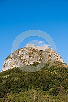 Vertical shot of Castle Montsegur on top of the hill in Cathar country, Ariege, Occitanie, France