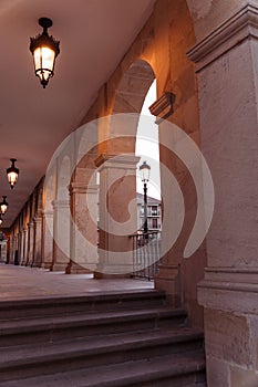 Vertical shot of Centro Cultural Palacio de la Audiencia building with arches, Soria, Spain photo