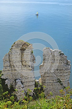 Vertical shot of Chambre des Demoiselles cave at seaside photo
