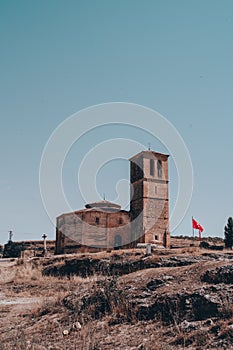 Vertical shot of the church of Vera Cruz in Zamarramala, Spain photo