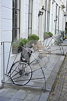 Vertical shot of a classic bike parked on a street