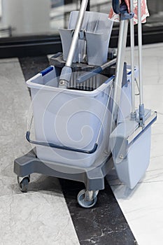 Vertical shot of Cleaning Tool Set . cleaning kit on a trolley . commercial cleaning concept