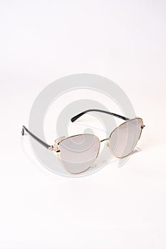 Vertical shot of clubmaster sunglasses isolated on white background