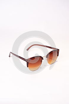 Vertical shot of Clubmaster sunglasses isolated on white background