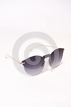 Vertical shot of clubmaster sunglasses isolated on white background