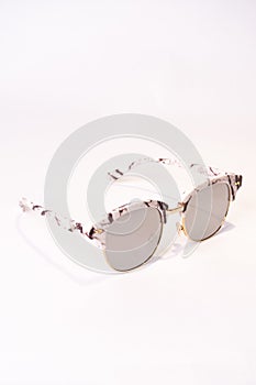 Vertical shot of Clubmaster sunglasses isolated on white background