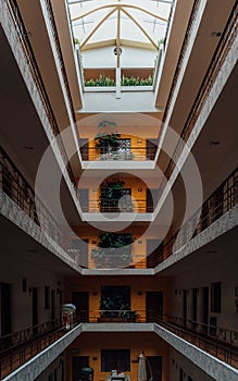 Vertical shot of the corridors of a hotel