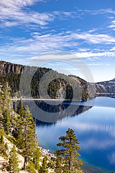 Vertical shot of the Crater lake in Oregon - the clearest lake in the world photo
