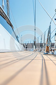 Vertical shot of the deck of a modern schooner on a sunny day