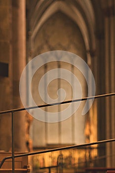 Vertical shot of details of pews and railings in Cologne Cathedral in Cologne, Germany