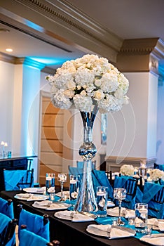 Vertical shot of the dining table in a wedding reception at The Peachtree Club in Atlanta, Georgia