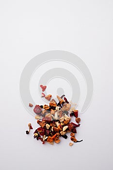 Vertical shot of dried rose petals isolated on white background