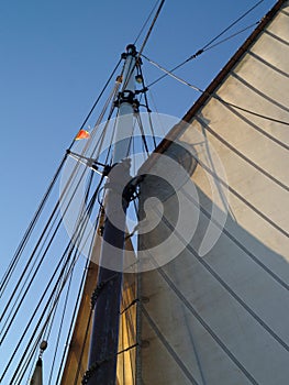 Vertical shot of a dutch flatboat in the open sea at daytime